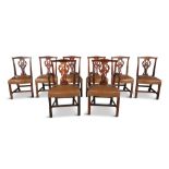 A SET OF EIGHT 19TH CENTURY MAHOGANY FRAMED DINING CHAIRS with shaped crest rail above pierced