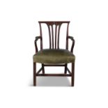 A GEORGE III MAHOGANY FRAMED ARMCHAIR the carved back with pierced vase splat,