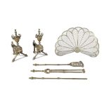 A COLLECTION OF BRASS FIRE SIDE IMPLEMENTS, comprising: a 'peacock' pierced brass spark guard,