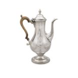 A GEORGE III SILVER COFFEE POT London c. 1790, mark of Hester Bateman, the body with bright-cut