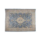 A PERSIAN RUG the central reserve woven with cream central lozenge, surrounded by geometric