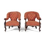 A PAIR OF VICTORIAN MAHOGANY FRAMED UPHOLSTERED ARMCHAIRS each covered in a button back orange