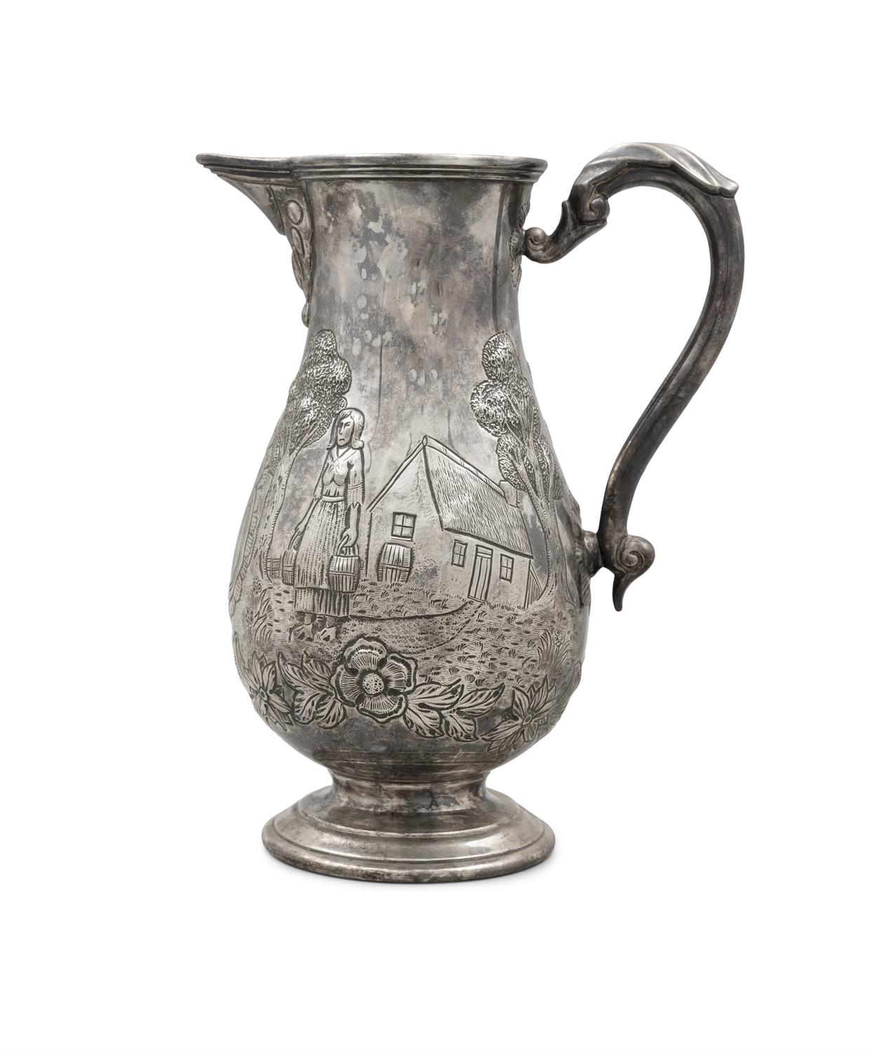 AN IRISH SILVER JUG Dublin 1973 with commemorative mark, the bulbuous body decorated in the