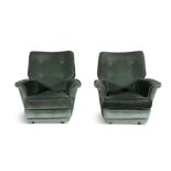 A PAIR OF GREEN VELOUR EASY ARMCHAIRS, each fitted with loose seat cushion and castors.