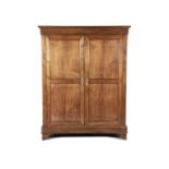 A CONTINENTAL TWO DOOR ARMOIRE, with moulded cornice and plain frieze, above a pair of