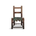 A 19TH CENTURY STAINED PINE SÚGÁN CHAIR, the rail back above a woven seat on square supports and