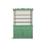 A 19TH CENTURY PAINTED PINE DRESSER IN GREEN AND WHITE, the swan neck and scrolling pediment,
