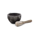 A STANDSTONE PESTLE AND MORTAR, the pestle with pine handles and stone grinder. 12(h) x 25(w)cm ;