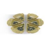 JOHN FFRENCH ARKLOW POTTERY PLATES moulded as cake slices, covered in light green glaze