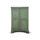 AN EARLY 19TH CENTURY PAINTED PINE COMPACT CUPBOARD, the moulded cornice above a panelled two-door
