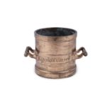 AN IMPERIAL GALLON BRONZE MEASURE of cylindrical form with attached handles, inscribed "Queen's