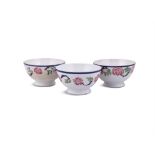 A COLLECTION OF THREE SPONGEWARE PORRIDGE BOWLS, the rim decorated with blue banding,