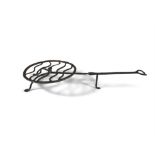 A 19TH CENTURY FORGED IRON ROTATING HEARTH ROASTING TRIVET. 68cm long