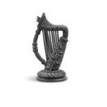 A 19TH CENTURY CARVED BOG OAK MODEL OF A HARP, profusely carved with shamrocks, crosshatching on a