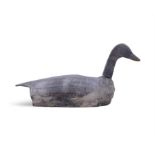 A LARGE CARVED DECOY, with rotating head. 80(w) x 38(h)cm