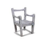 A 19TH CENTURY PAINTED PINE CHILD'S CHAIR, with plain panelled seat. 49 (h)cm