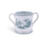 A 'LOVEFEAST' CUP, decorated with transfer printing on cream glaze and inscribed 'Lovefeast',