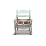 A PAINTED PINE CHILD'S SUGÁN ARMCHAIR, with plain arm rests, on cabriole legs with stretchers,