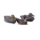 A COLLECTION OF THREE CARVED AND PAINTED DECOY DUCKS. 35cm (3)