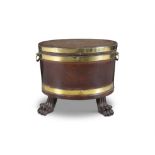 AN IRISH GEORGE III MAHOGANY AND BRASS BOUND OVAL WINE COOLER, with hinged cover and brass