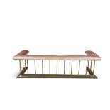 A LARGE VICTORIAN BRASS GALLERY AND PINK LEATHER UPHOLSTERED CLUB FENDER 197cm wide; 51cm high;