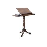 A WILLIAM IV ROSEWOOD MUSIC / READING STAND, the top with ratchet mechanism, each side with