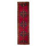 AN OLD WOOL RUNNER, YAHYALI CENTRAL TURKEY, 412 x 118cm The central field woven with a series of