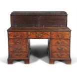 A FINE GEORGE III MAHOGANY ESTATE MANAGER’S DESK the superstructure with brass fretwork gallery,