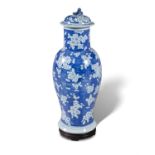 A BLUE AND WHITE CHINESE VASE AND COVER, 20TH CENTURY, of baluster from, with domed lid,