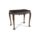 A FINE IRISH GEORGE III MAHOGANY TRAY-TOP CENTRE TABLE, the plain dished top above an undulating