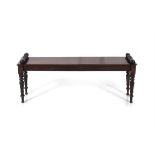 A WILLIAM IV MAHOGANY LONG HALL BENCH, with carved scroll ends to each rid, raised on baluster