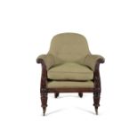 AN IRISH WILLIAM IV MAHOGANY FRAMED LIBRARY ARMCHAIR, with domed padded button back and loose