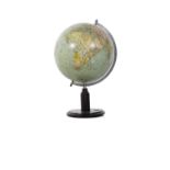 A TERRESTIAL GLOBE, 1940s supported on an engraved steel arc, and turned base 53cm h x 31.