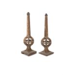 A PAIR OF VICTORIAN CAST IRON OBELISKS, cast with register number "RS Co". 73cm high and 70cm