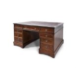 A 19TH CENTURY MAHOGANY 18-DRAWER PARTNERS DESK, the rectangular top inset with red leather