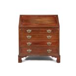 AN IRISH GEORGE III INLAID MAHOGANY SLOPEFRONT BUREAU, BY BUTLER OF DUBLIN, STAMPED the fall