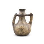 A PRE-COLOMBIAN POTTERY TWO HANDLED VESSEL of ovoid shape, decorated with geometric motifs,