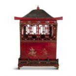 A CHINESE RED AND GILT LACQUER WEDDING CARRIAGE in the form of a pagoda, with detachable domed