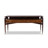 CONSOLE A rosewood console with four drawers with brass handles and brass capped feet. Italy, c.