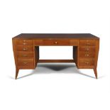 GIO PONTI (1891 - 1979) A walnut desk by Gio Ponti with brass detailing. Italy, c.1954.