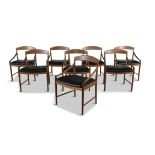 TOM ROBERTSON A set of eight teak carver dining chairs (all carvers) by Tom Robertson for A.