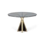 RENATO ZEVI A circular glass-topped table on gilt metal base by Renato Zevi. Italy, c.1960.