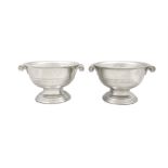 CHAMPAGNE COOLERS A pair of Marinoni pewter champagne coolers. 42 x 35 x 24cm(h) each