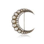 A 19TH CENTURY PEARL AND DIAMOND BROOCH The stylised crescent moon set with graduated pearls and