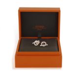 A PAIR OF DIAMOND 'FINESSE' EARRINGS, BY HERMÈS Each toggle clasp motif pavé-set with