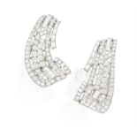 A PAIR OF DIAMOND BROOCHES, FRENCH, CIRCA 1955 Of openwork scrolling design, set with