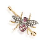 A LATE 19TH CENTURY GEMSET BROOCH, CIRCA 1980 The gold bar brooch centring a stylised bee