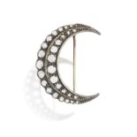 A LATE 19TH CENTURY DIAMOND BROOCH, CIRCA 1880 Of crescent moon design, set with old-cut