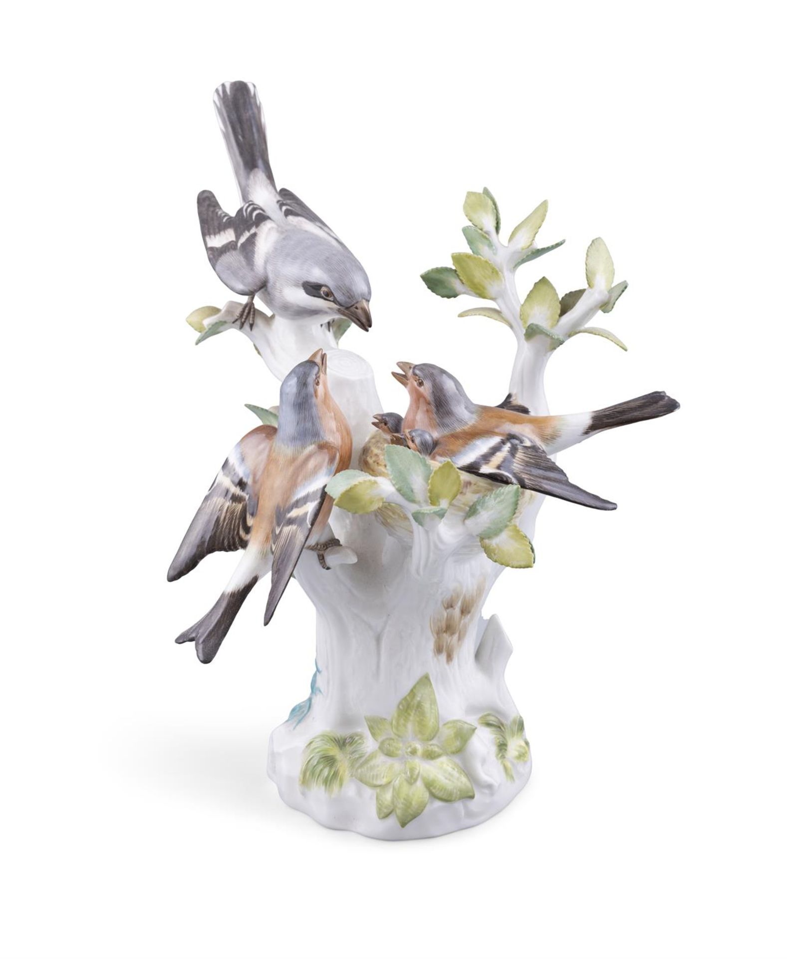 A 19TH CENTURY MEISSEN PAINTED PORCELAIN GROUP OF NESTING WRENS in a leafy bough protecting the