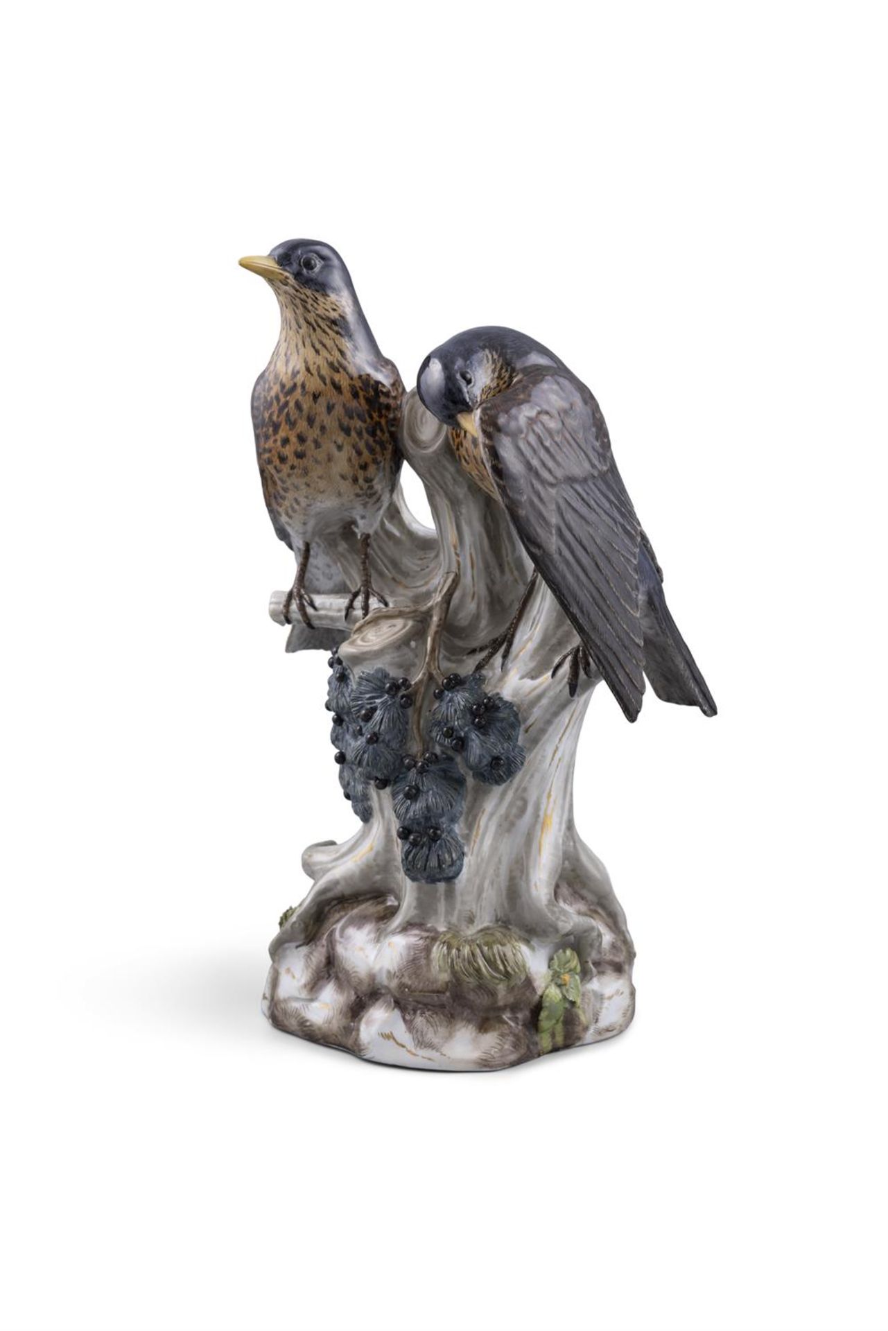 A 19TH CENTURY MEISSEN PAINTED PORCELAIN MODEL OF TWO THRUSHES, on a tree trunk with fruiting